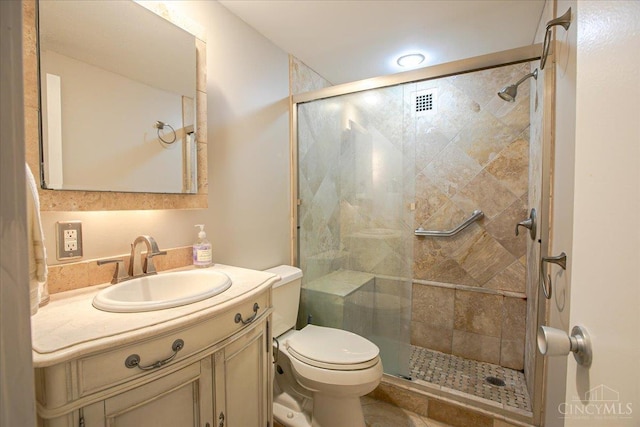 2324 Madison Rd Unit 506, Cincinnati, OH 45208 - full bathroom featuring toilet, vanity, and a shower stall