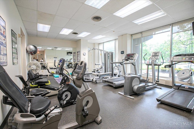 2324 Madison Rd Unit 506, Cincinnati, OH 45208 - workout area featuring healthy amount of natural light and a paneled ceiling