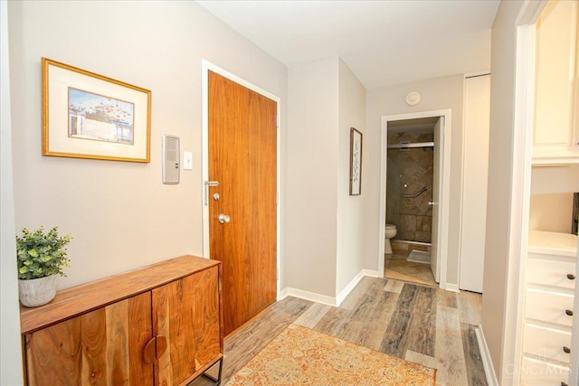 2324 Madison Rd Unit 506, Cincinnati, OH 45208 - foyer entrance with light wood-style floors and baseboards
