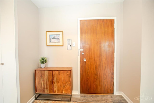 2324 Madison Rd Unit 506, Cincinnati, OH 45208 - doorway with baseboards and wood finished floors