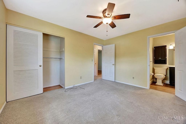 8714 Wuest Rd, Colerain Twp, OH 45251 - unfurnished bedroom featuring carpet flooring, a closet, baseboards, and connected bathroom