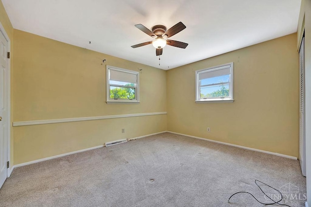 8714 Wuest Rd, Colerain Twp, OH 45251 - unfurnished bedroom featuring carpet, baseboards, and a ceiling fan