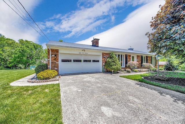 8714 Wuest Rd, Colerain Twp, OH 45251 - ranch-style home featuring brick siding, a chimney, concrete driveway, a garage, and a front lawn