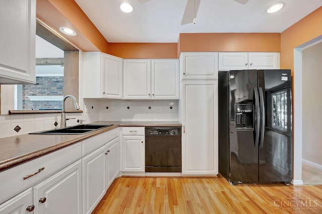 8714 Wuest Rd, Colerain Twp, OH 45251 - kitchen with black appliances, a sink, white cabinets, tasteful backsplash, and recessed lighting