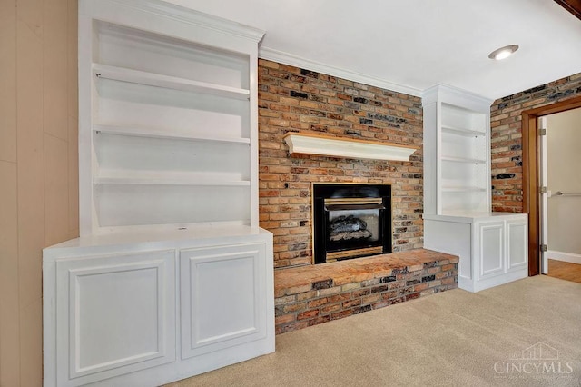 8714 Wuest Rd, Colerain Twp, OH 45251 - unfurnished living room featuring a fireplace, carpet flooring, and built in features