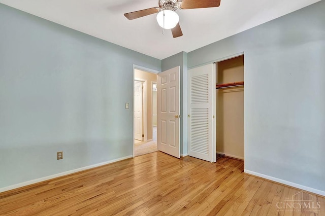8714 Wuest Rd, Colerain Twp, OH 45251 - unfurnished bedroom featuring baseboards, light wood-style flooring, a closet, and a ceiling fan