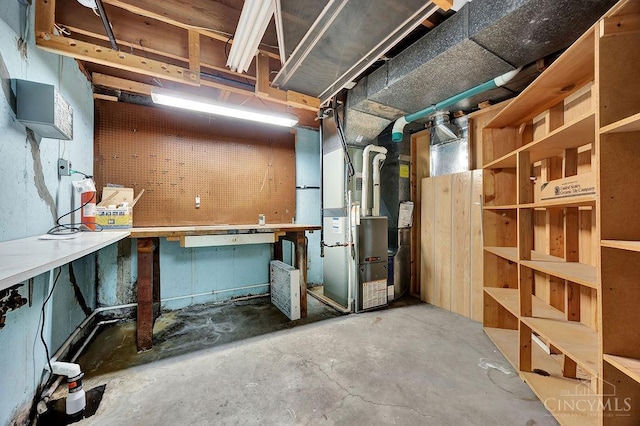 8714 Wuest Rd, Colerain Twp, OH 45251 - unfinished basement with a workshop area and heating unit