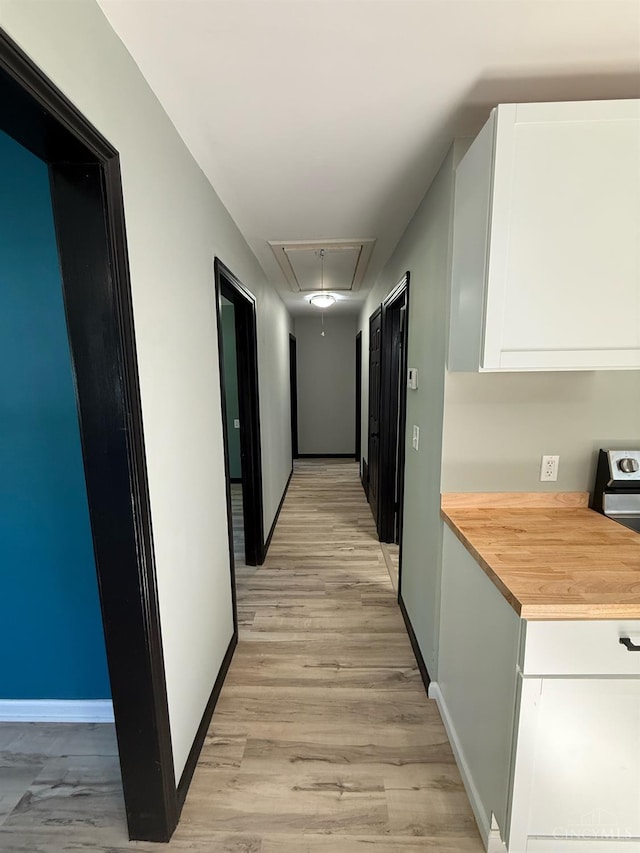5776 State Route 132, Stonelick Twp, OH 45103 - hall featuring attic access, baseboards, and light wood finished floors