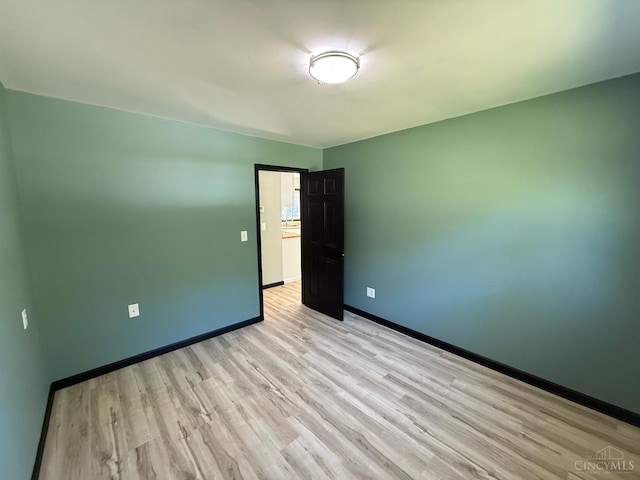 5776 State Route 132, Stonelick Twp, OH 45103 - empty room featuring light wood-style flooring and baseboards