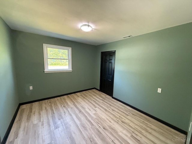 5776 State Route 132, Stonelick Twp, OH 45103 - empty room with light wood finished floors and baseboards