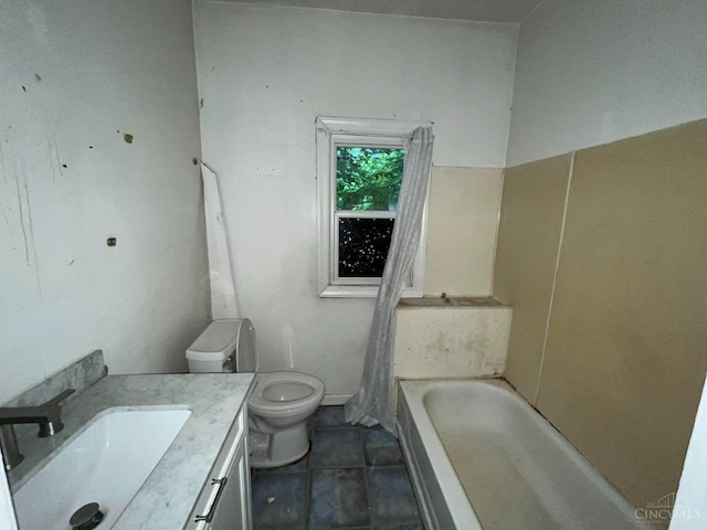 2840 Wilbraham Rd, Middletown, OH 45042 - bathroom with a bathtub, toilet, vanity, and tile patterned flooring