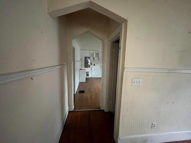 2840 Wilbraham Rd, Middletown, OH 45042 - hallway with wood finished floors, a wainscoted wall, and arched walkways