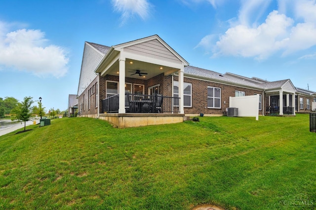 5014 S Castle Ct, Liberty Twp, OH 45011 - back of house with ceiling fan, brick siding, a yard, and cooling unit