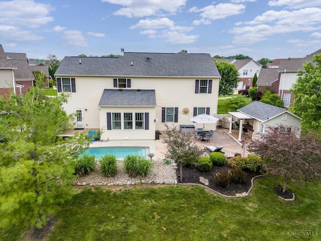 1171 Craig Ct, Hamilton Twp, OH 45039 - back of house with a patio, a yard, a residential view, and an outdoor pool