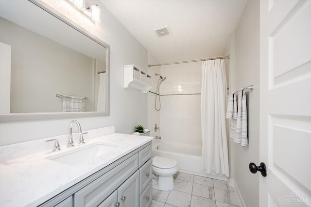 1171 Craig Ct, Hamilton Twp, OH 45039 - full bath featuring vanity, marble look tiles, toilet, and shower / bath combo