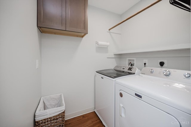 1171 Craig Ct, Hamilton Twp, OH 45039 - laundry room with cabinet space, separate washer and dryer, dark wood-type flooring, and baseboards