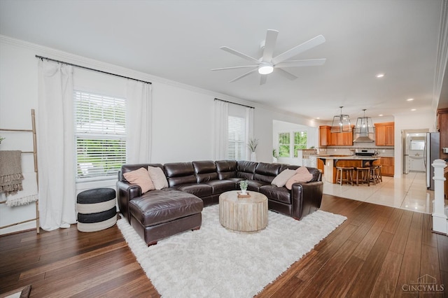 1171 Craig Ct, Hamilton Twp, OH 45039 - living room featuring ornamental molding, light wood-type flooring, ceiling fan, and recessed lighting