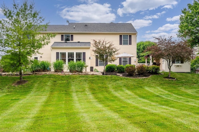 1171 Craig Ct, Hamilton Twp, OH 45039 - back of house featuring a lawn