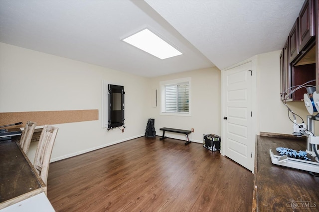 1171 Craig Ct, Hamilton Twp, OH 45039 - kitchen with dark wood-style floors, dark brown cabinets, and baseboards