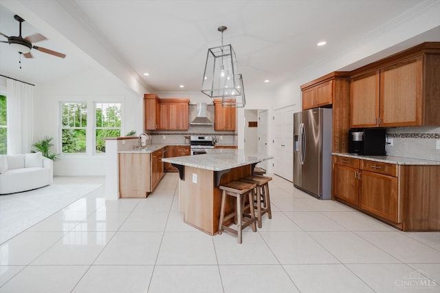 1171 Craig Ct, Hamilton Twp, OH 45039 - kitchen featuring wall chimney exhaust hood, stainless steel appliances, a sink, brown cabinets, and tasteful backsplash