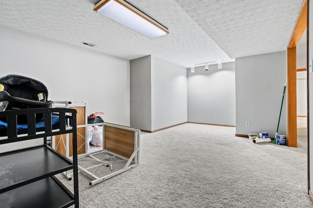 2020 Woodcreek Dr, Fairfield, OH 45014 - carpeted office with a textured ceiling, baseboards, and track lighting