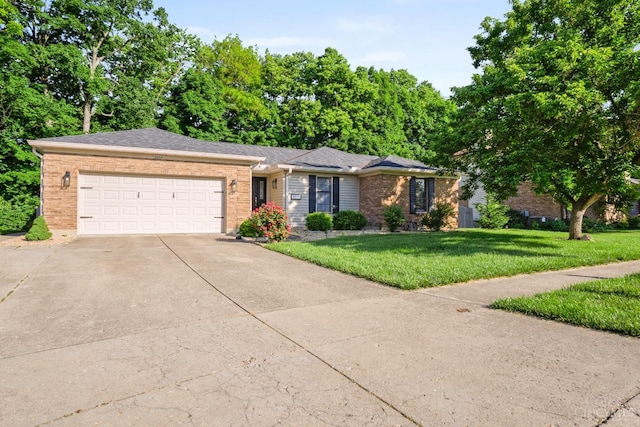2020 Woodcreek Dr, Fairfield, OH 45014 - ranch-style home with an attached garage, concrete driveway, a front lawn, and brick siding