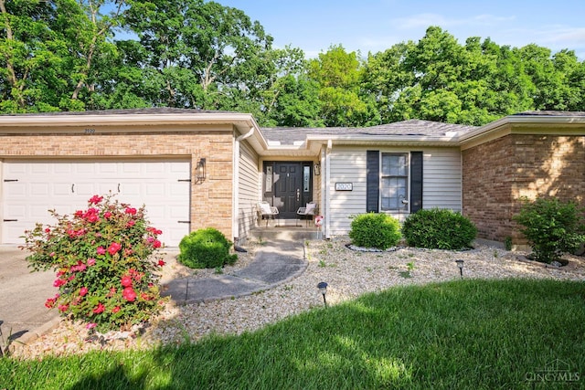 2020 Woodcreek Dr, Fairfield, OH 45014 - ranch-style house with brick siding and a garage