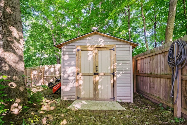 2020 Woodcreek Dr, Fairfield, OH 45014 - view of shed with a fenced backyard