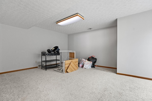 2020 Woodcreek Dr, Fairfield, OH 45014 - misc room featuring carpet flooring, baseboards, and a textured ceiling