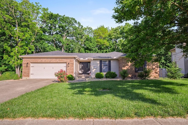 2020 Woodcreek Dr, Fairfield, OH 45014 - single story home with a garage, concrete driveway, a front yard, and brick siding