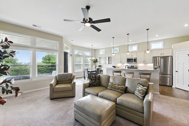 1387 Lake Run Dr, Turtle Creek Twp, OH 45036 - living area with dark carpet, recessed lighting, ceiling fan, and baseboards