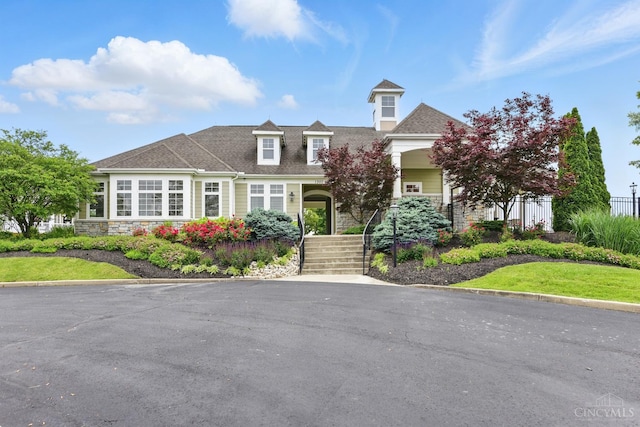1387 Lake Run Dr, Turtle Creek Twp, OH 45036 - view of front of property with stone siding and a shingled roof