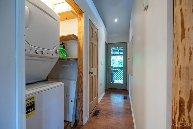 1182 Hook Morgan Rd, Concord Twp, OH 45679 - laundry room with stacked washing machine and dryer, wood finished floors, baseboards, and recessed lighting