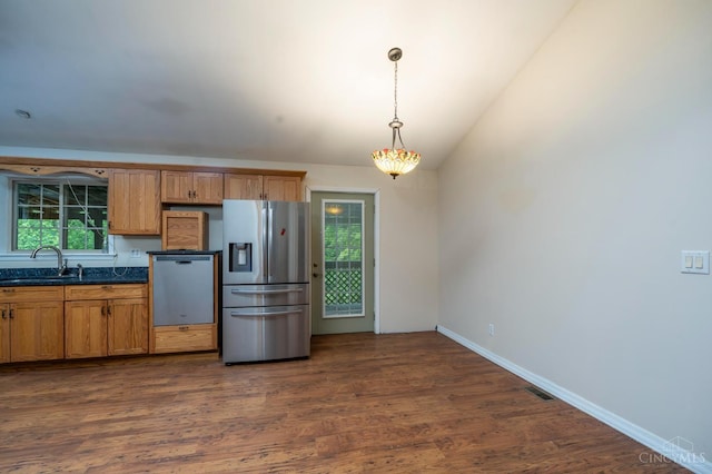 1182 Hook Morgan Rd, Concord Twp, OH 45679 - kitchen with stainless steel refrigerator with ice dispenser, a sink, dark countertops, dark wood-style floors, and pendant lighting