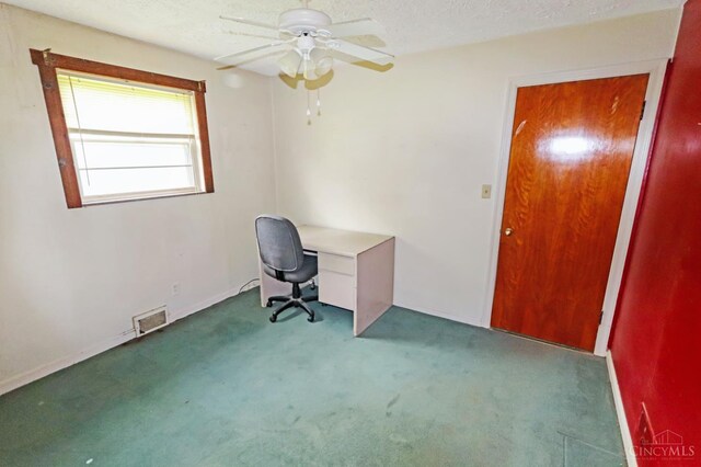 738 Clough Pike, Union Twp, OH 45245 - unfurnished office with carpet, ceiling fan, baseboards, and a textured ceiling
