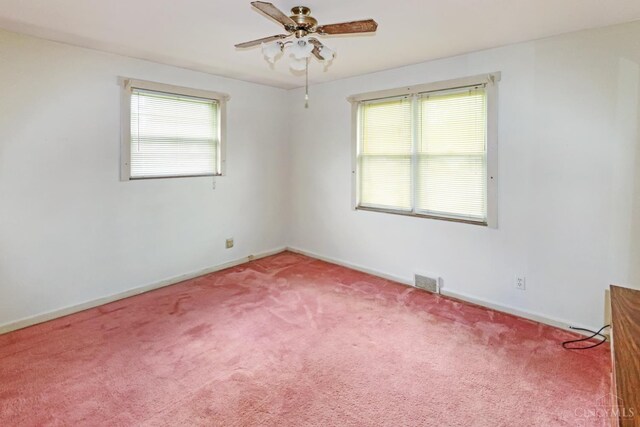 738 Clough Pike, Union Twp, OH 45245 - carpeted spare room featuring plenty of natural light, ceiling fan, and baseboards