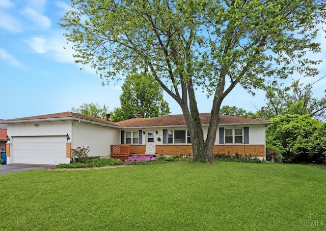 738 Clough Pike, Union Twp, OH 45245 - single story home featuring an attached garage, a front lawn, driveway, and brick siding