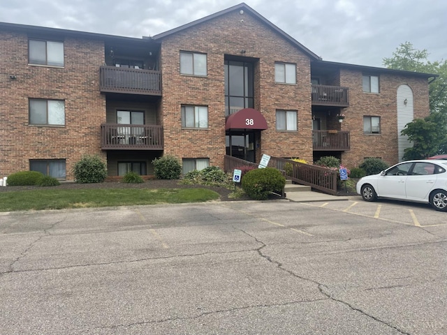 38 Providence Dr Unit 54, Fairfield, OH 45014 - view of apartment building / complex featuring uncovered parking