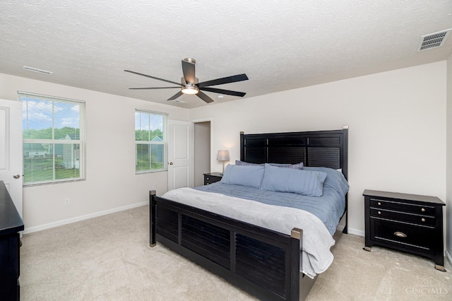 6482 Tralee Ln, Goshen Twp, OH 45122 - bedroom with light carpet, baseboards, a ceiling fan, and a textured ceiling