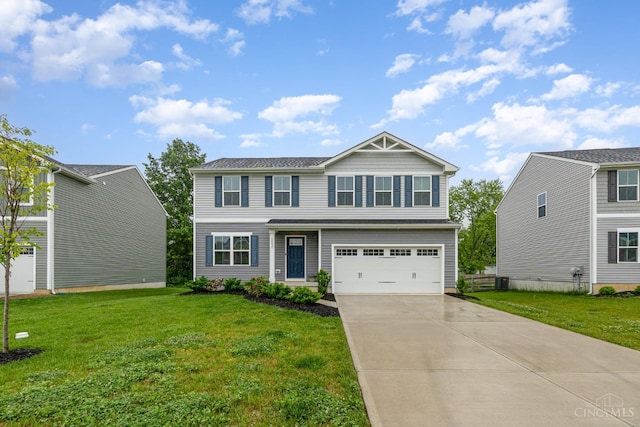 6482 Tralee Ln, Goshen Twp, OH 45122 - view of front of home featuring driveway, a garage, and a front lawn
