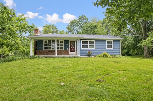 9488 Daugherty Marks Rd, Clark Twp, OH 45130 - view of front of property with a chimney and a front lawn