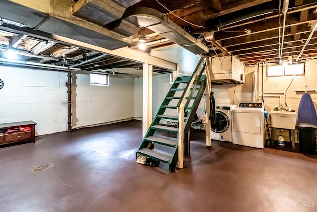 5411 Lester Rd, Cincinnati, OH 45213 - below grade area featuring independent washer and dryer, stairs, and a sink