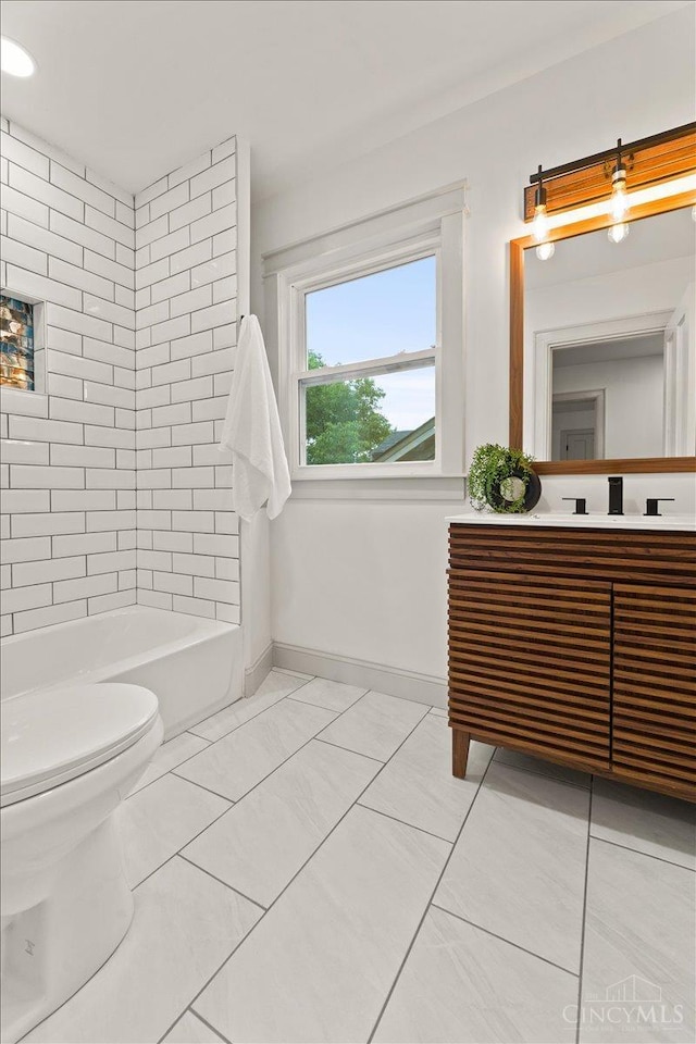 3970 Abington Ave, Cincinnati, OH 45229 - bathroom featuring vanity, tile patterned floors, and bathing tub / shower combination