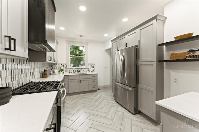 3970 Abington Ave, Cincinnati, OH 45229 - kitchen featuring appliances with stainless steel finishes, range hood, gray cabinetry, light countertops, and recessed lighting