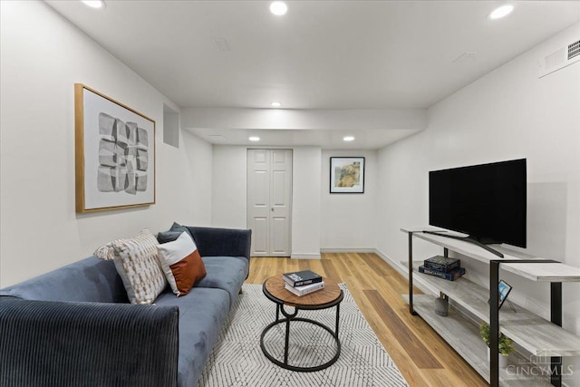 3970 Abington Ave, Cincinnati, OH 45229 - living area featuring light wood-style flooring and recessed lighting