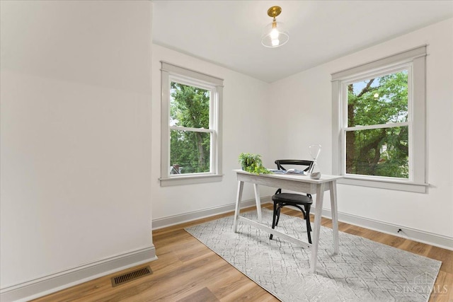 3970 Abington Ave, Cincinnati, OH 45229 - home office featuring wood finished floors
