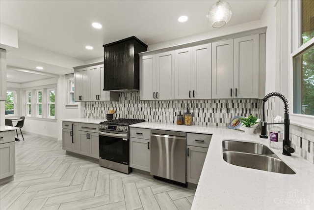 3970 Abington Ave, Cincinnati, OH 45229 - kitchen with appliances with stainless steel finishes, decorative backsplash, plenty of natural light, gray cabinetry, and recessed lighting