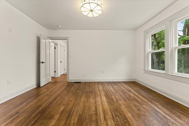 3970 Abington Ave, Cincinnati, OH 45229 - unfurnished room with dark wood finished floors and baseboards