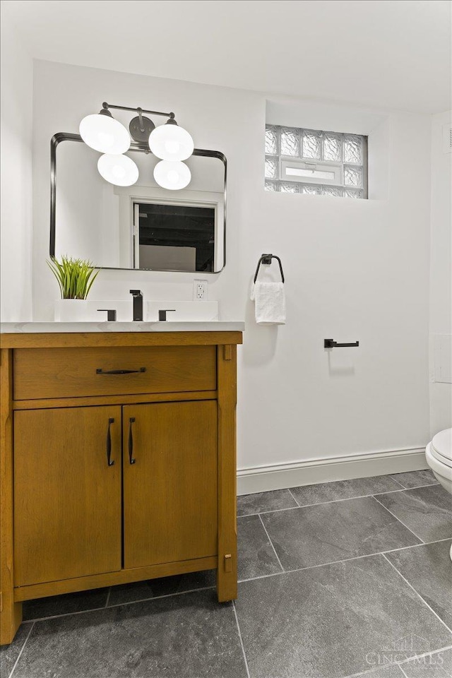 3970 Abington Ave, Cincinnati, OH 45229 - bathroom with vanity and baseboards