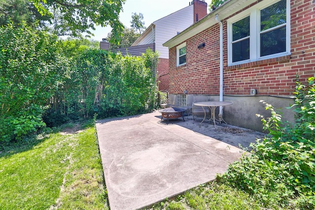 5038 W High St, Cincinnati, OH 45238 - view of patio / terrace with a fire pit